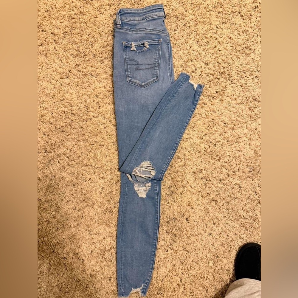 AE distressed blue jeans